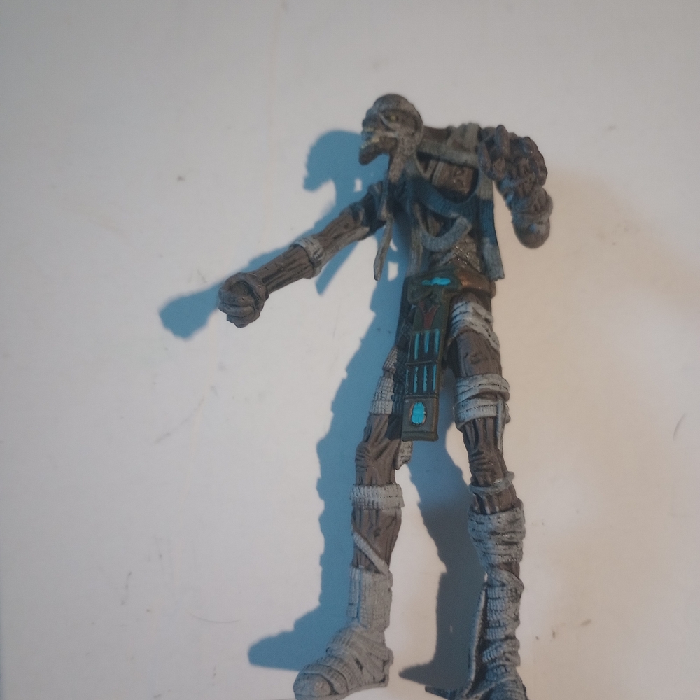 Action Figure with Bandaged Design